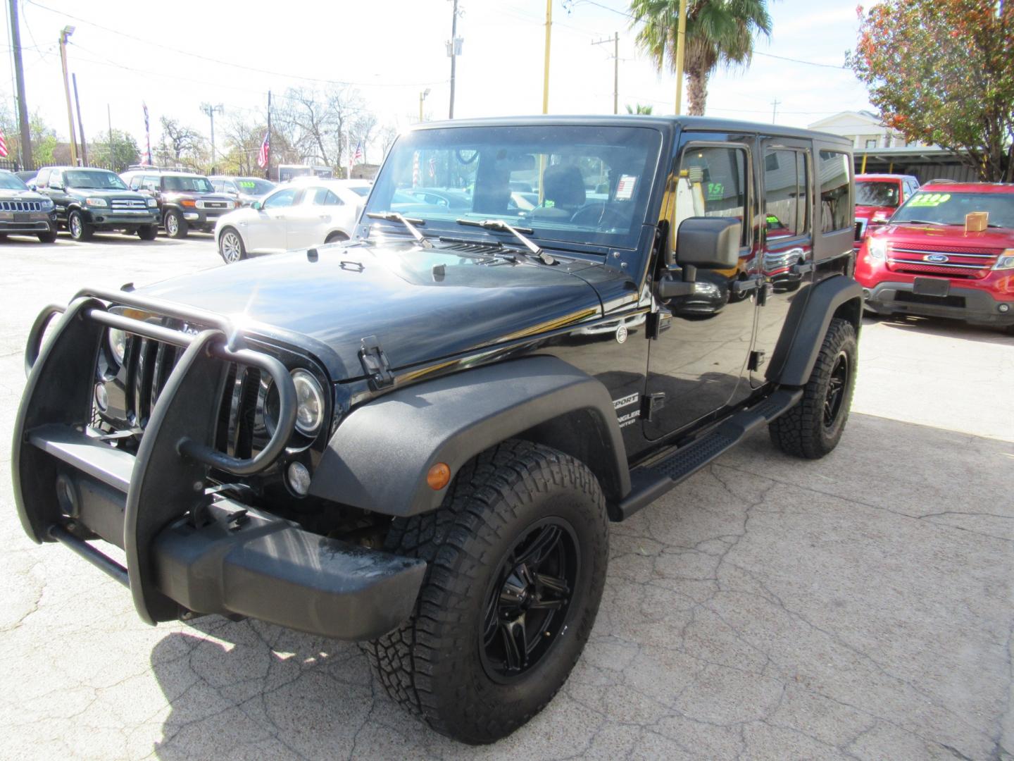 2017 Black /Black Jeep Wrangler UNLIMITED SPORT (1C4BJWDG1HL) with an 3.6L V6 F DOHC 24V engine, Automatic transmission, located at 1511 North Shepherd Dr., Houston, TX, 77008, (281) 657-1221, 29.798361, -95.412560 - 2017 JEEP WRANGLER UNLIMITED SPORT VIN: 1C4BJWDG1HL517754 1 C 4 B J W D G 1 H L 5 1 7 7 5 4 4 DOOR WAGON/SPORT UTILITY 3.6L V6 F DOHC 24V GASOLINE REAR WHEEL DRIVE W/ 4X4 - Photo#33